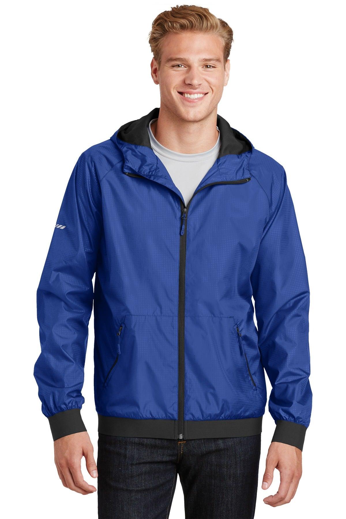 Sport-Tek Embossed Hooded Wind Jacket. JST53 - Dresses Max